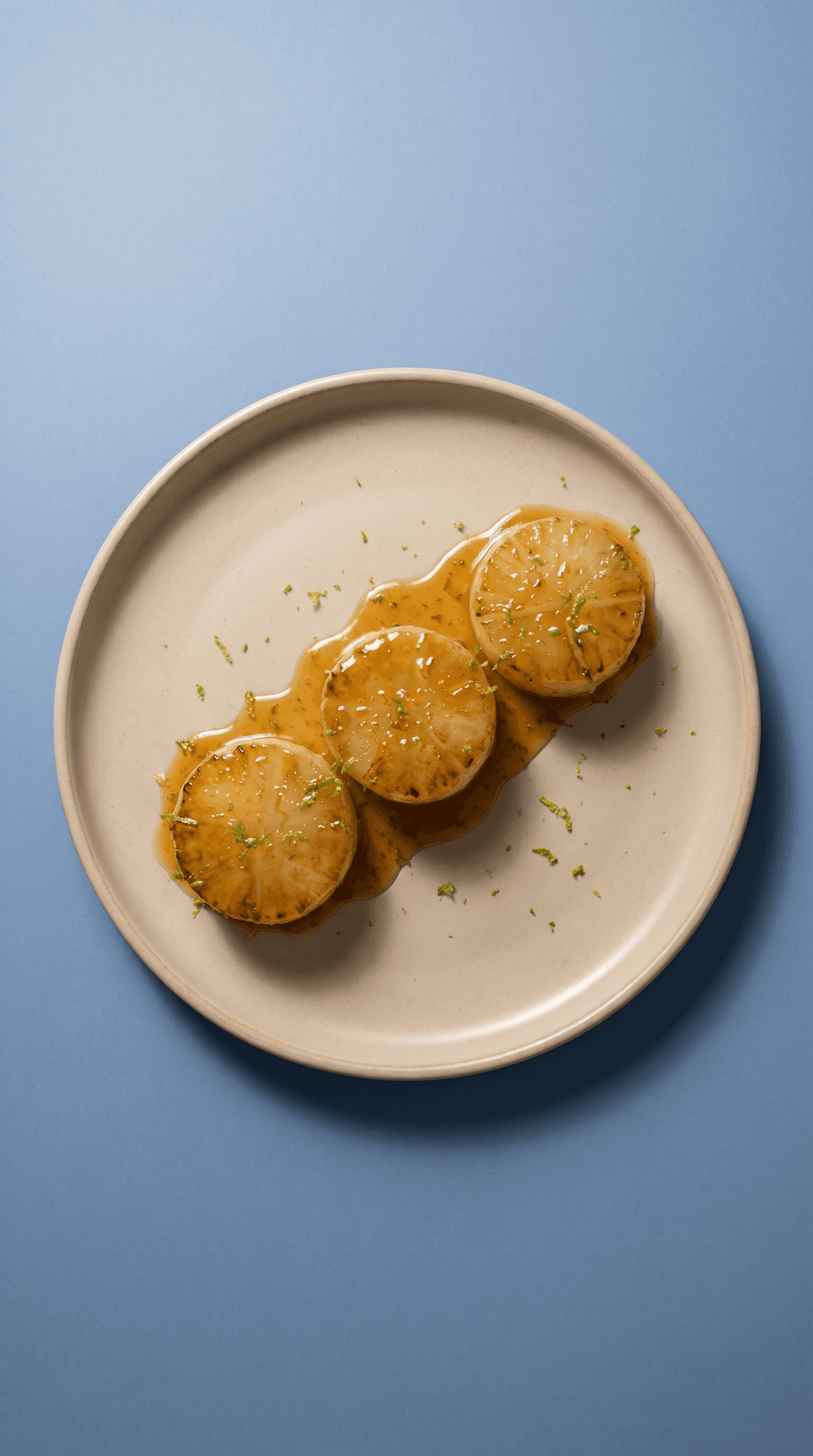 Citrus-Honey Glazed Daikon with Beurre-Monté Sauce van Mr. Saucy